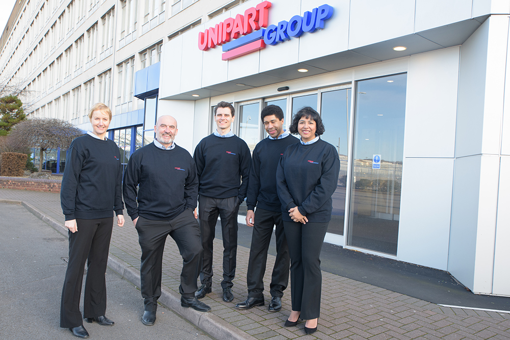 Unipart employees outside Unipart House reception