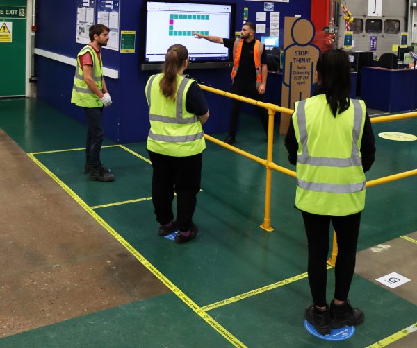Unipart colleagues practicing safety at work