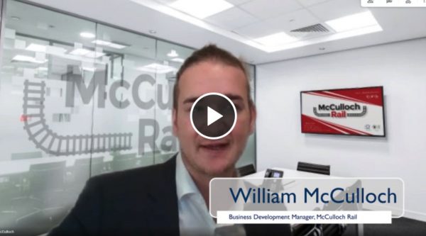 William McCulloch being interviewed in an office