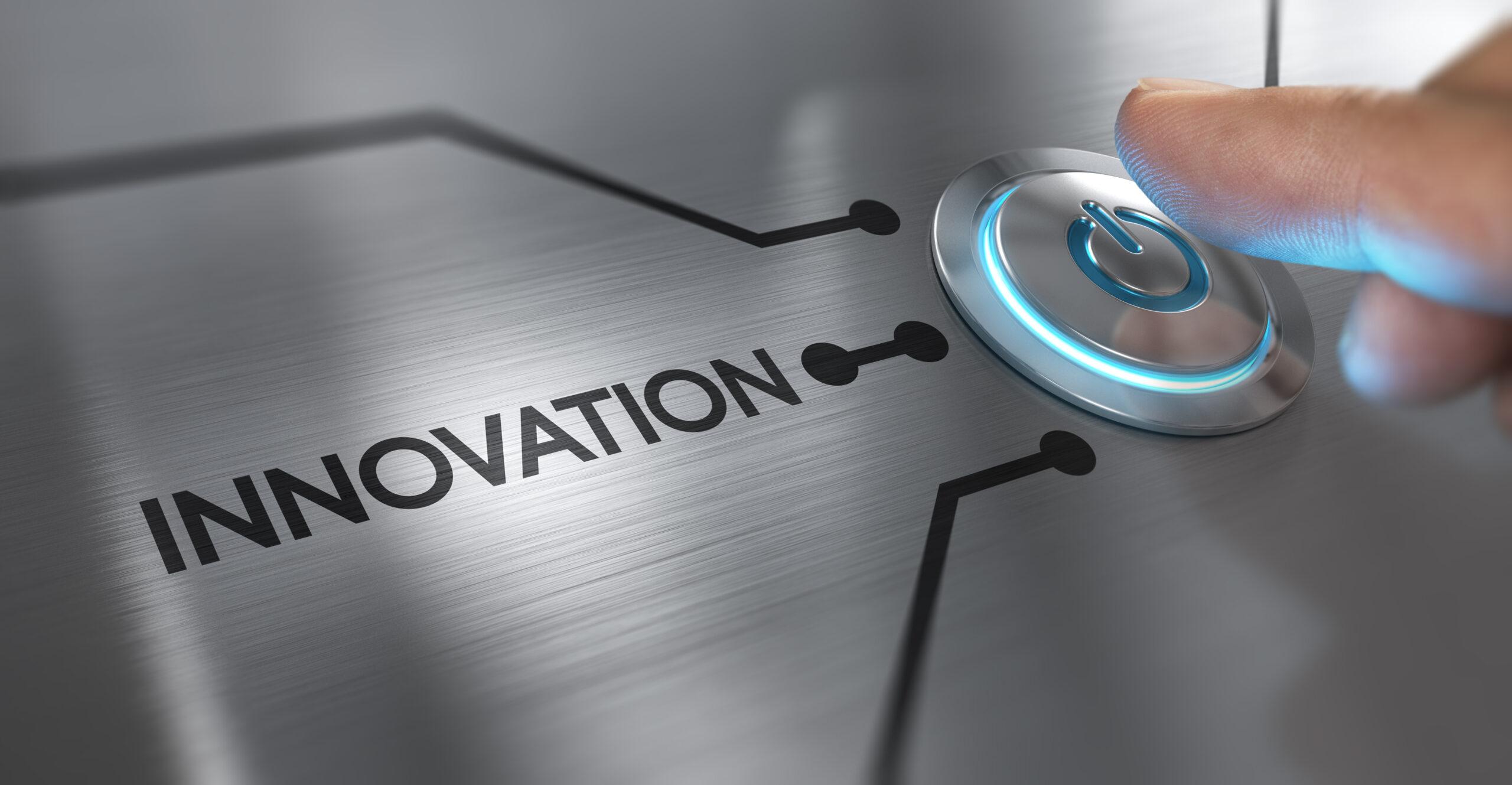 Finger about to press a start button with the word innovation on the left.