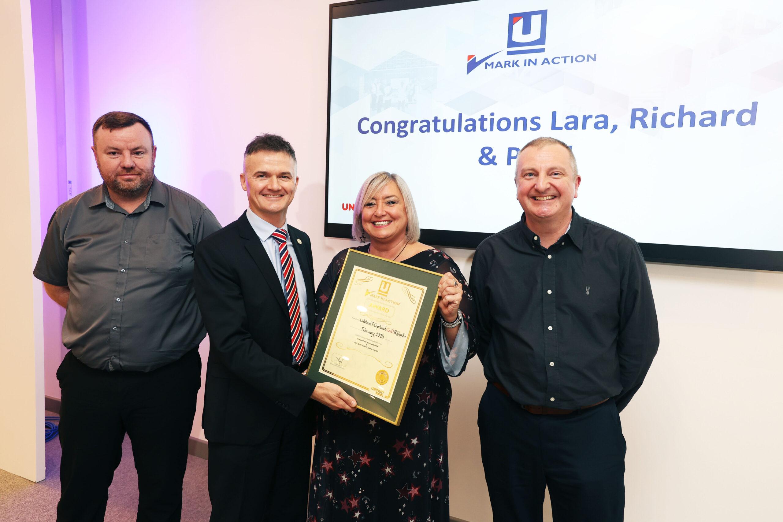 Mark in Action ceremony - Unipart CEO, Darren Leigh, awarding a certificate to colleagues.
