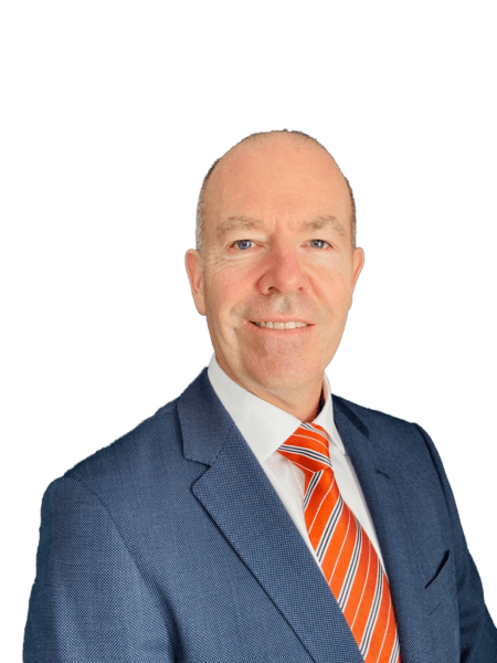 Headshot of Dominic Edmonds in grey suit with orange striped tie.