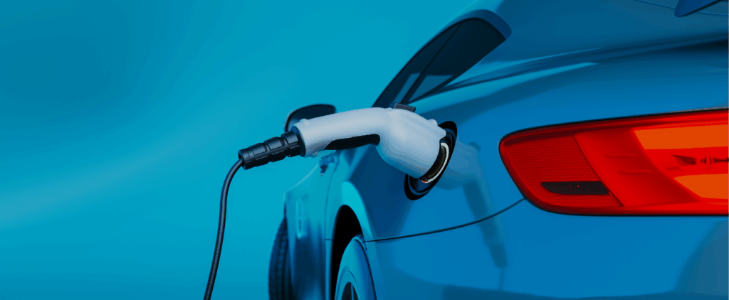 Electric vehicle being charged by an EV charger