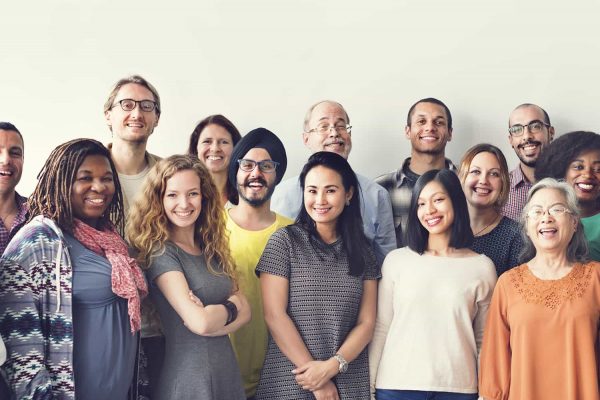 Group of diverse people smiling.