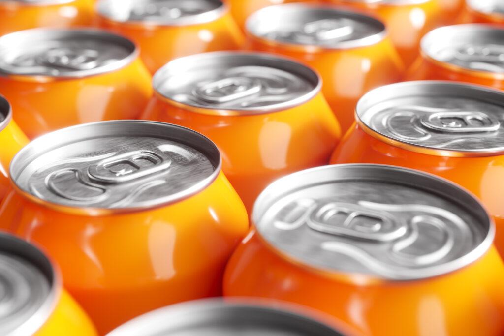Orange soft drink cans.